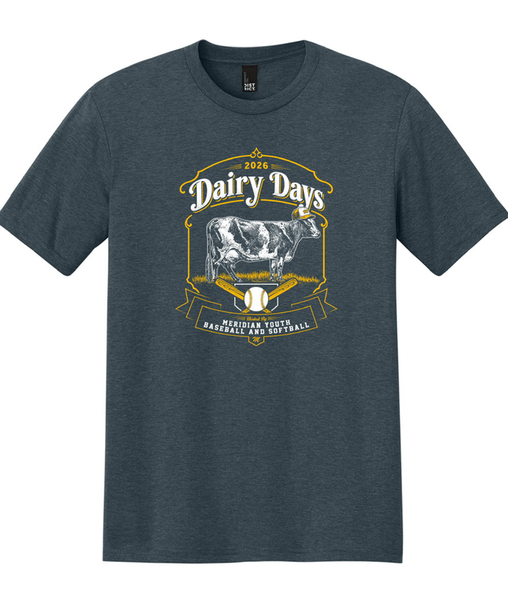 2026 Dairy Days t-shirt — navy tee with a baseball-cap-wearing dairy cow over crossed bats and a baseball, hosted by Meridian Youth Baseball and Softball.